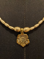 Cosmo Brass Pendant Necklace