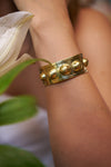 Bobble brass bangle