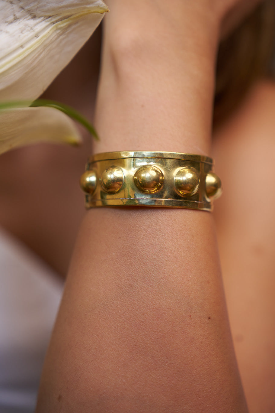 Bobble brass bangle